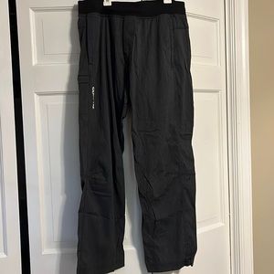 Men’s athletic pants, gray stripes. Lots of pockets